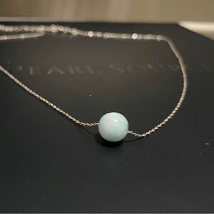 Elegant Silver Necklace with Larimar bead pendant on silver chain